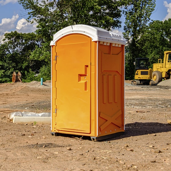 how often are the portable restrooms cleaned and serviced during a rental period in Lewis Iowa